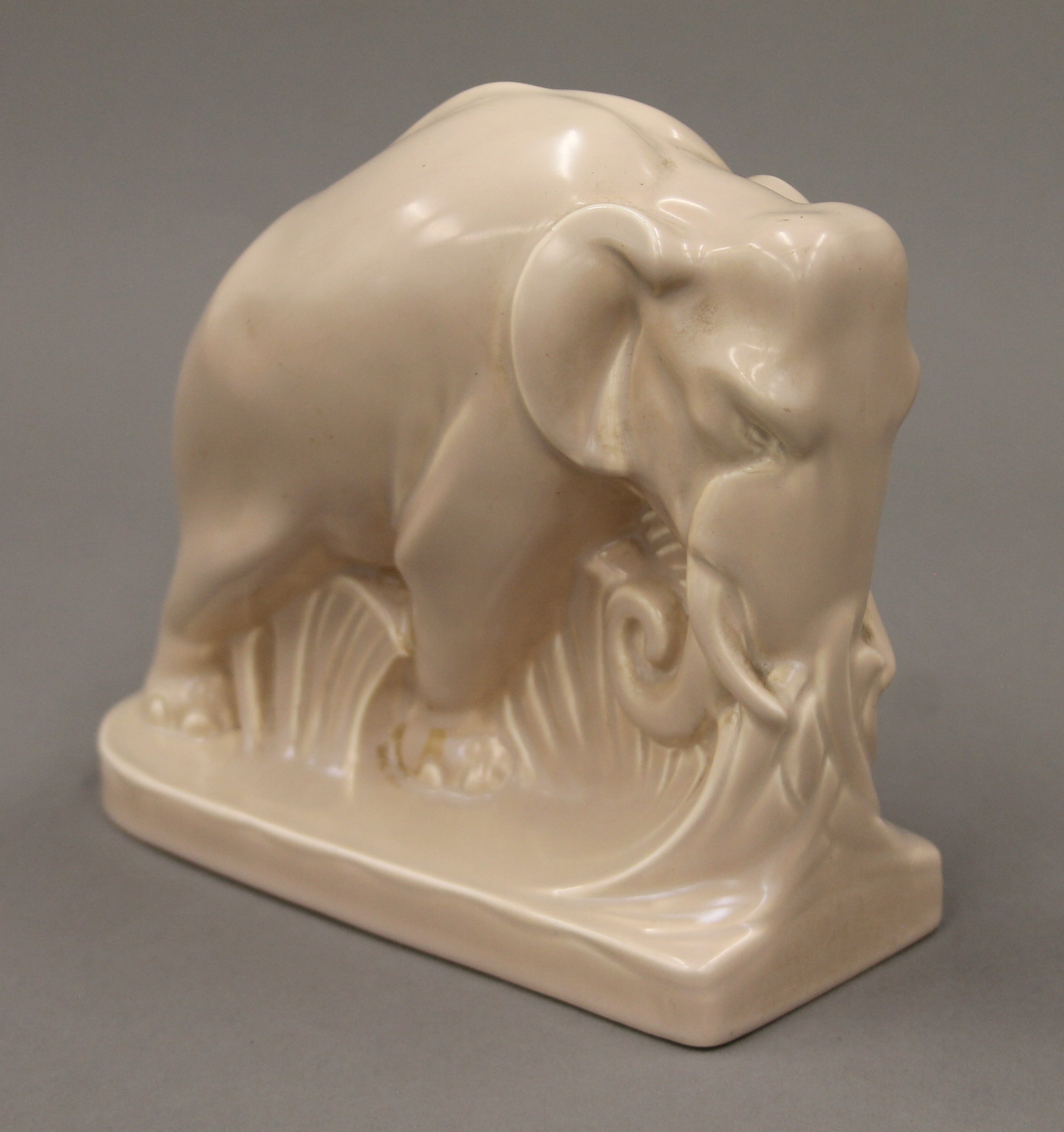 A pair of Poole pottery elephant form bookends. 18.5 cm long. - Image 3 of 6