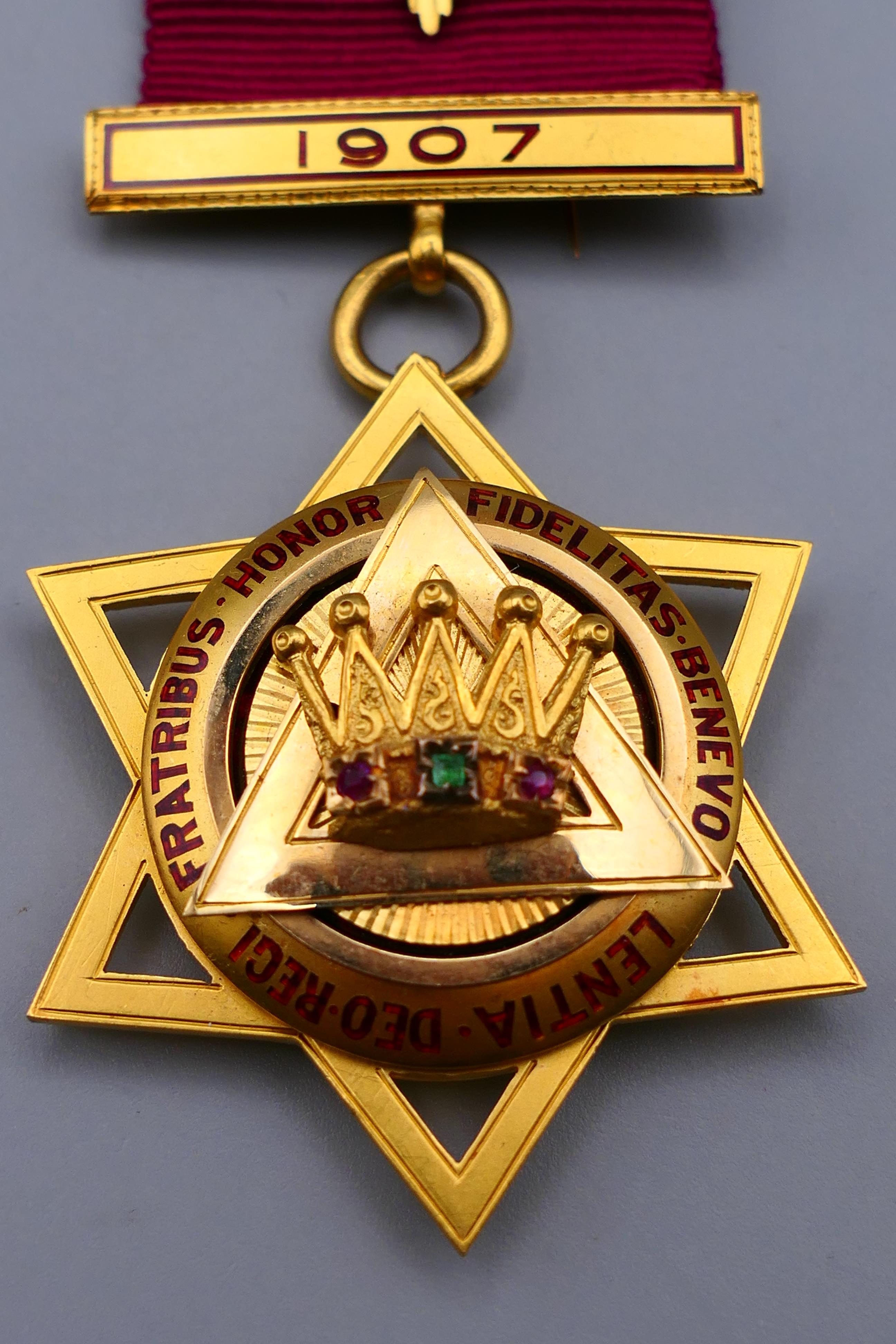 An 18 ct gold Masonic Bulawayo 1907 medal, the reverse inscribed, boxed. 11.5 cm high. - Image 3 of 8