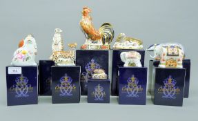 Ten boxed Royal Crown Derby paperweights.