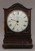 A 19th century mahogany bracket clock, the inscribed F Sinderby London. 43.5 cm high.