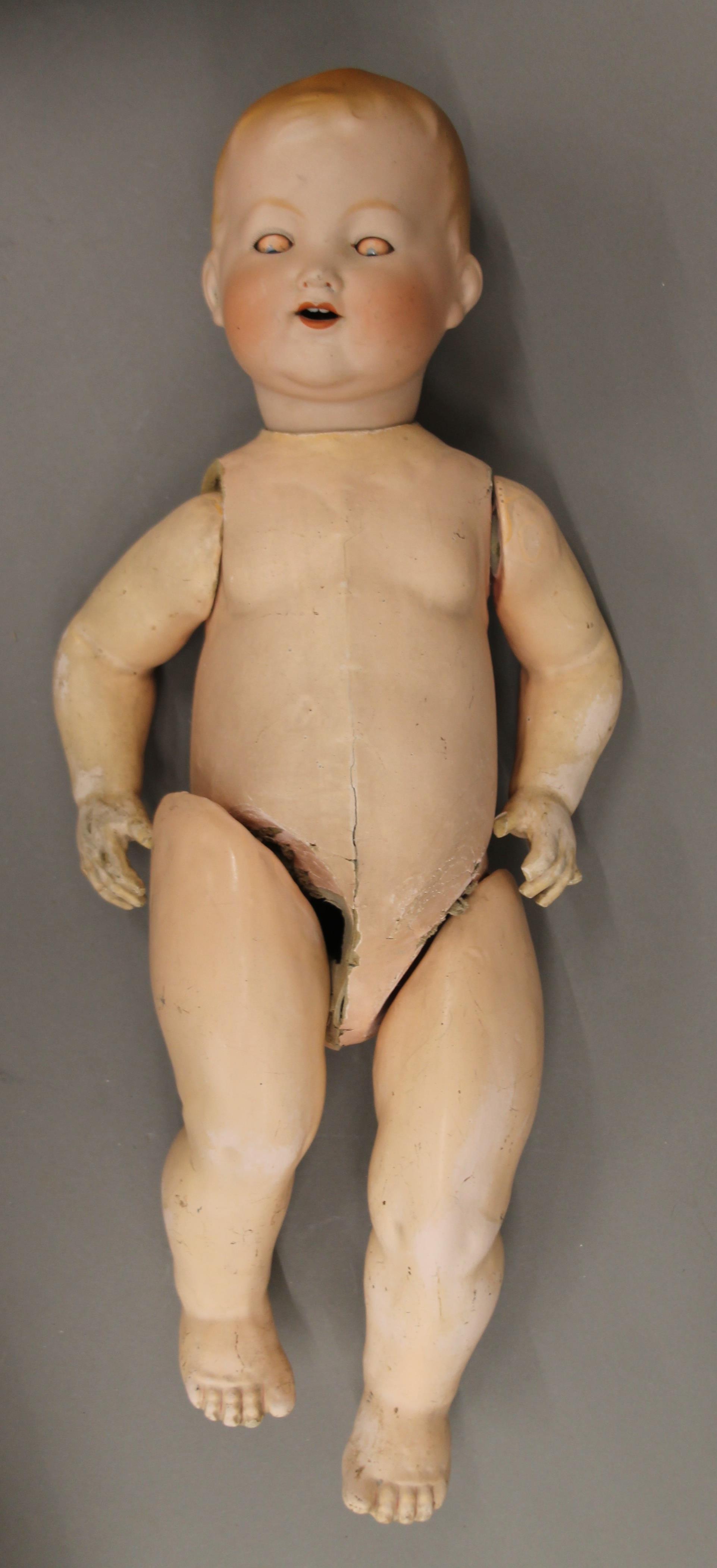 An Armand Marseille bisque headed doll, a lace Christening gown and another dolls head. - Image 2 of 6