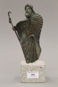 A 20th century Spanish bronze figure mounted on a display plinth. 24.5 cm high.