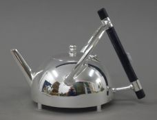 A Christopher Dresser style teapot. 14.5 cm high.