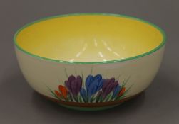 An A J Wilkinson Ltd honey glaze bowl, decorated in the Clarice Cliff Crocus pattern. 19.