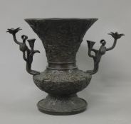 A Japanese bronze vase. 17.5 cm high.