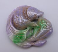 A jade fish pendant. 5.5 cm wide.
