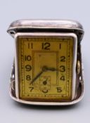 An Art Deco Mato Watch Co sterling silver cased travel watch. 5.5 cm x 3.5 cm.