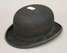 A Dunn and Co bowler hat.