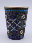 A Russian silver and enamel tot cup. 4.75 cm high.