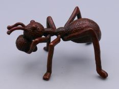 A bronze model of an ant. 5 cm long.