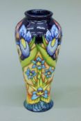 A Moorcroft Geneva Trial vase. 20 cm high.