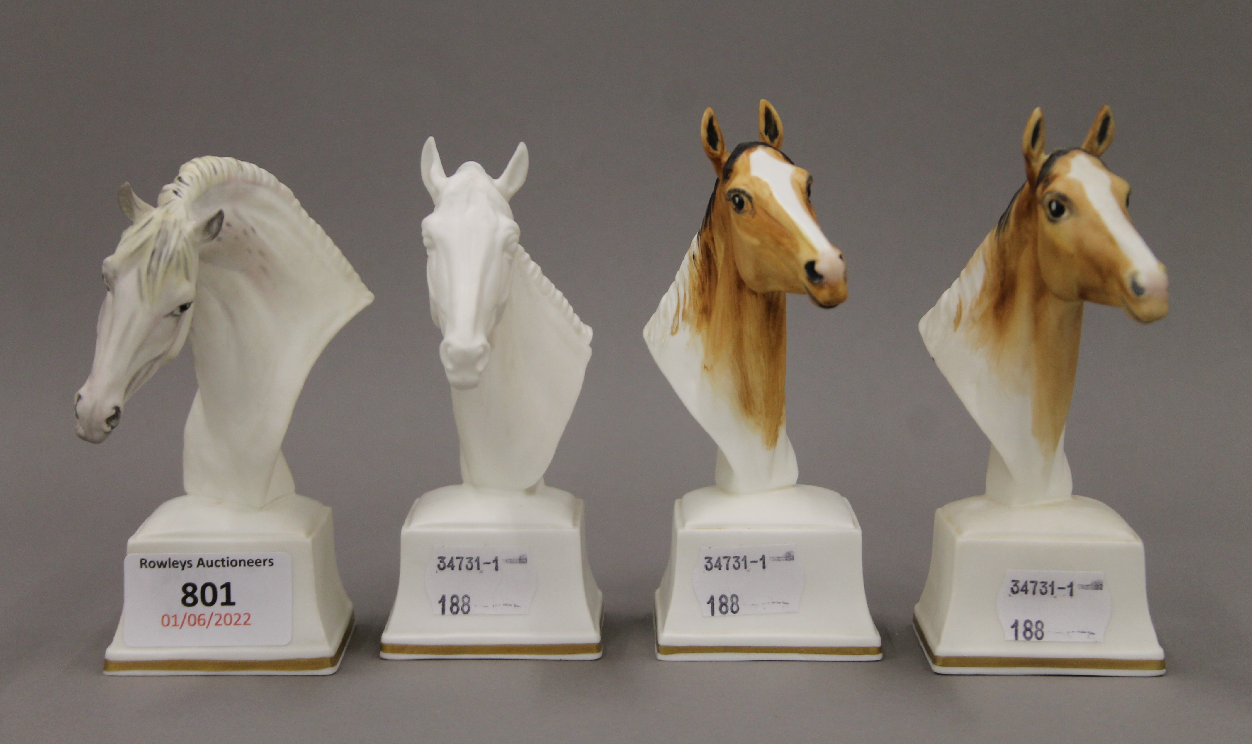 Four Royal Worcester horse busts. The largest 13 cm high.