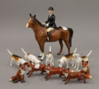 A Beswick hunt group and a pack of foxes.