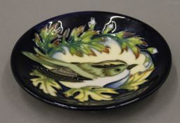 A Moorcroft Ingleswood pin dish. 12 cm diameter.