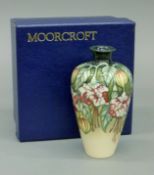 A Moorcroft Fuchsia vase, numbered 108/300, boxed. 14.5 cm high.