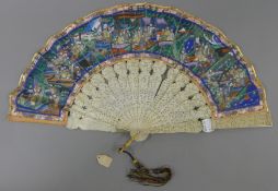 A 19th century Canton ivory fan. 28 cm long.