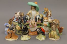 A collection of Beswick and Royal Albert Beatrix Potter figurines.