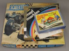 A vintage boxed Scalextric set and various other toys/games.