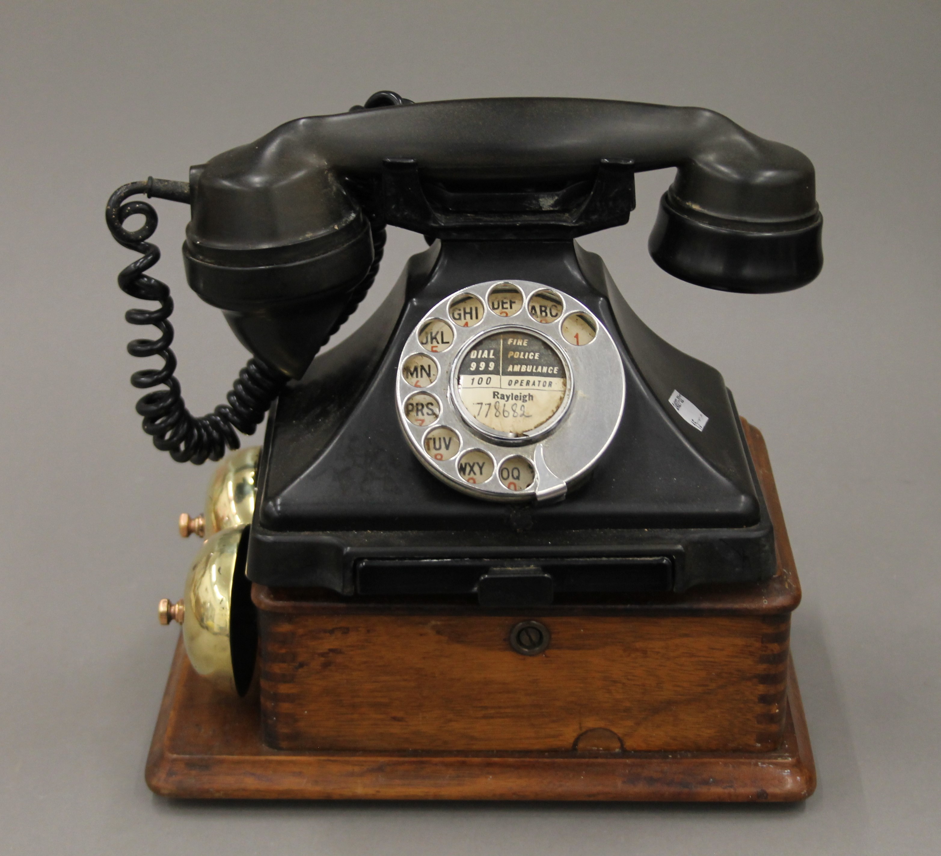 A bakelite telephone with bell box and exchange. The exchange 29.5 cm wide. - Image 2 of 11