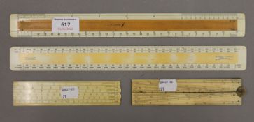 Two Victorian ivory rulers and two others. The largest 33 cm long.