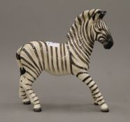 A Beswick zebra. 17.5 cm high.