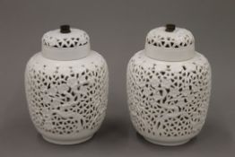 A pair of early 20th century blanc-de-chine table lamps. 20 cm high.