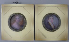 A pair of framed miniatures. 9 cm high overall.