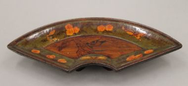 A Chinese lacquered wooden fan shape dish decorated with butterflies, birds, etc.