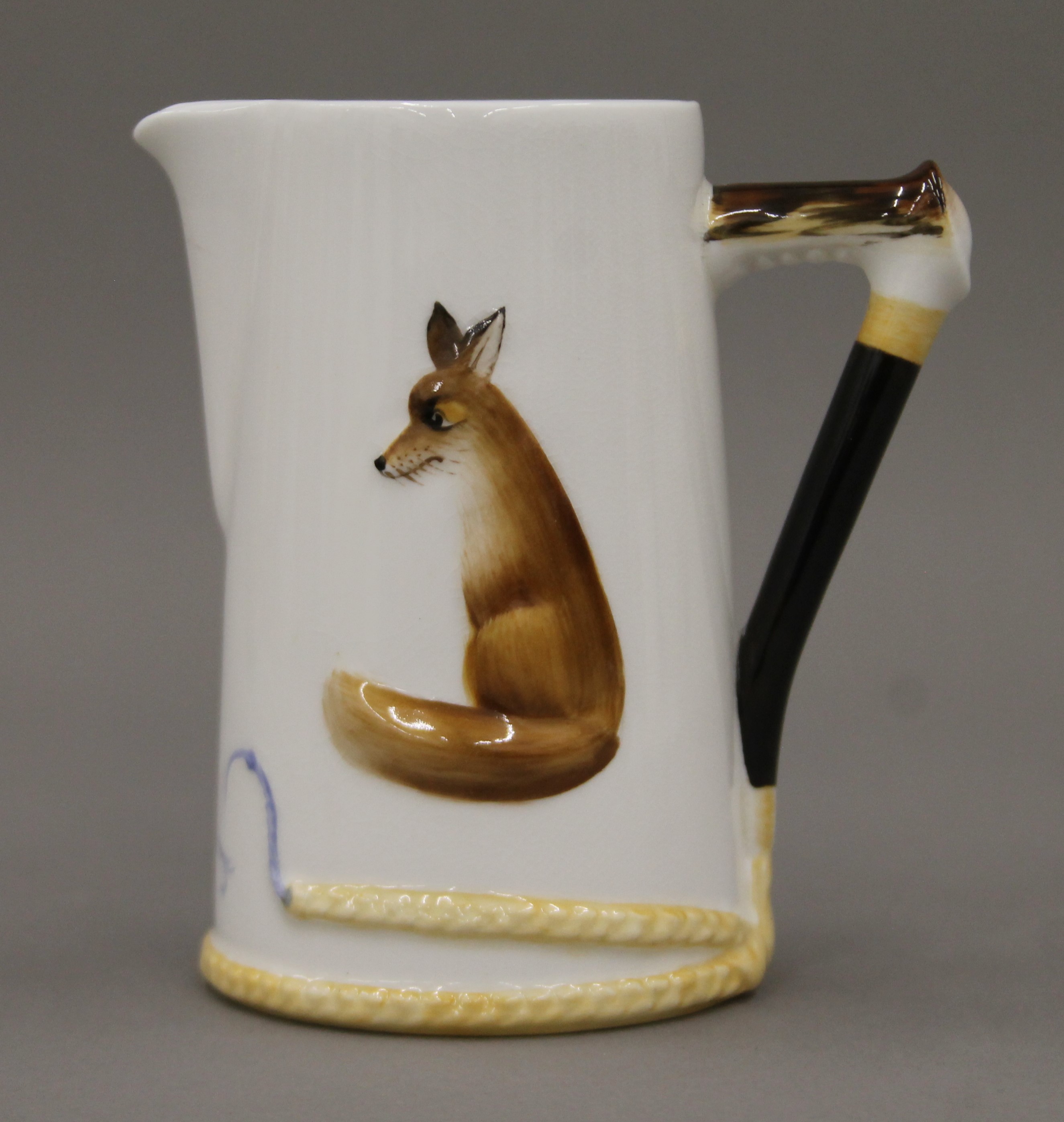 A Royal Doulton Reynard the Fox coffee can and saucer, and a cream jug. The latter 11 cm high. - Image 4 of 6