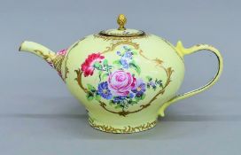 A 19th century enamel teapot. 27 cm long.