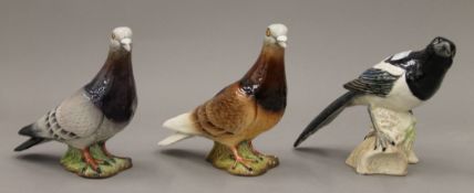 Two Beswick pigeons and a Beswick magpie. The latter 12 cm high.