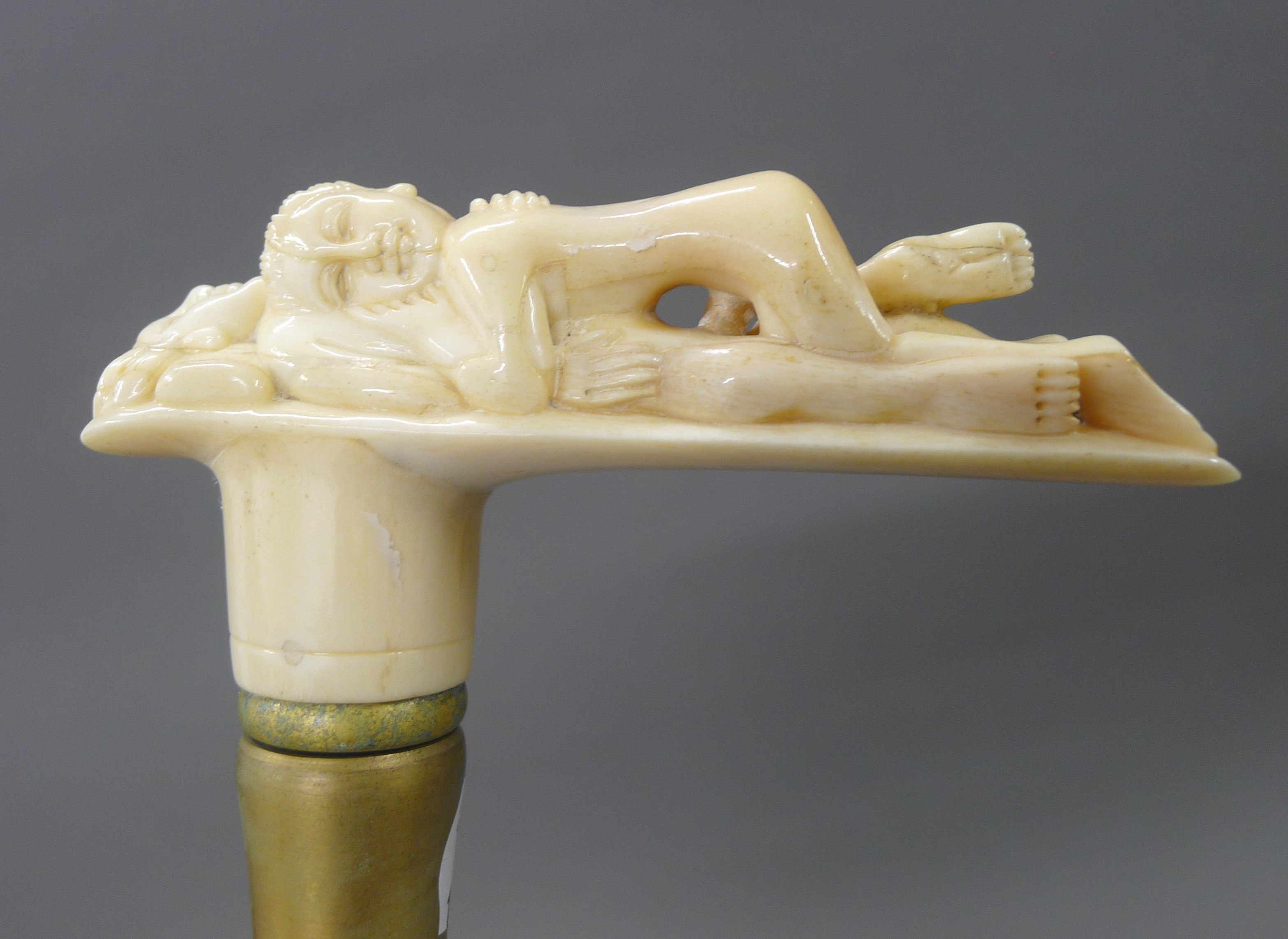 A walking stick with a carved bone erotic handle. 90 cm high. - Image 4 of 4
