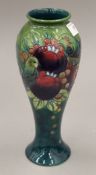 A Moorcroft Finches Teal vase. 27 cm high.