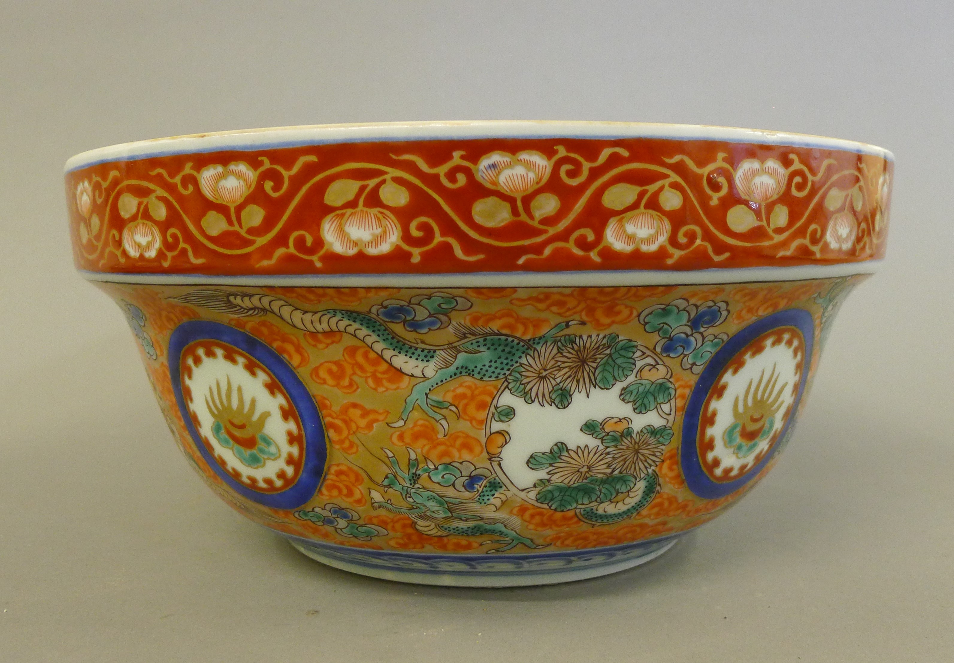 A Chinese porcelain orange lidded tureen decorated with dragons. 18 cm high. - Image 6 of 7