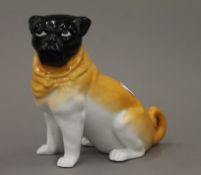 A 19th century model of a pug dog. 16 cm high.