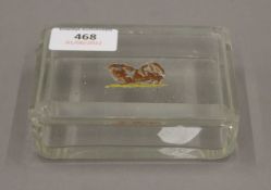 A Baccarat glass box, the lid reverse engraved with a Pekingese dog. 11 cm wide.