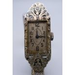 An Art Deco 18 ct white gold ladies cocktail watch on mesh strap, boxed. Watch 4 cm x 1.5 cm.