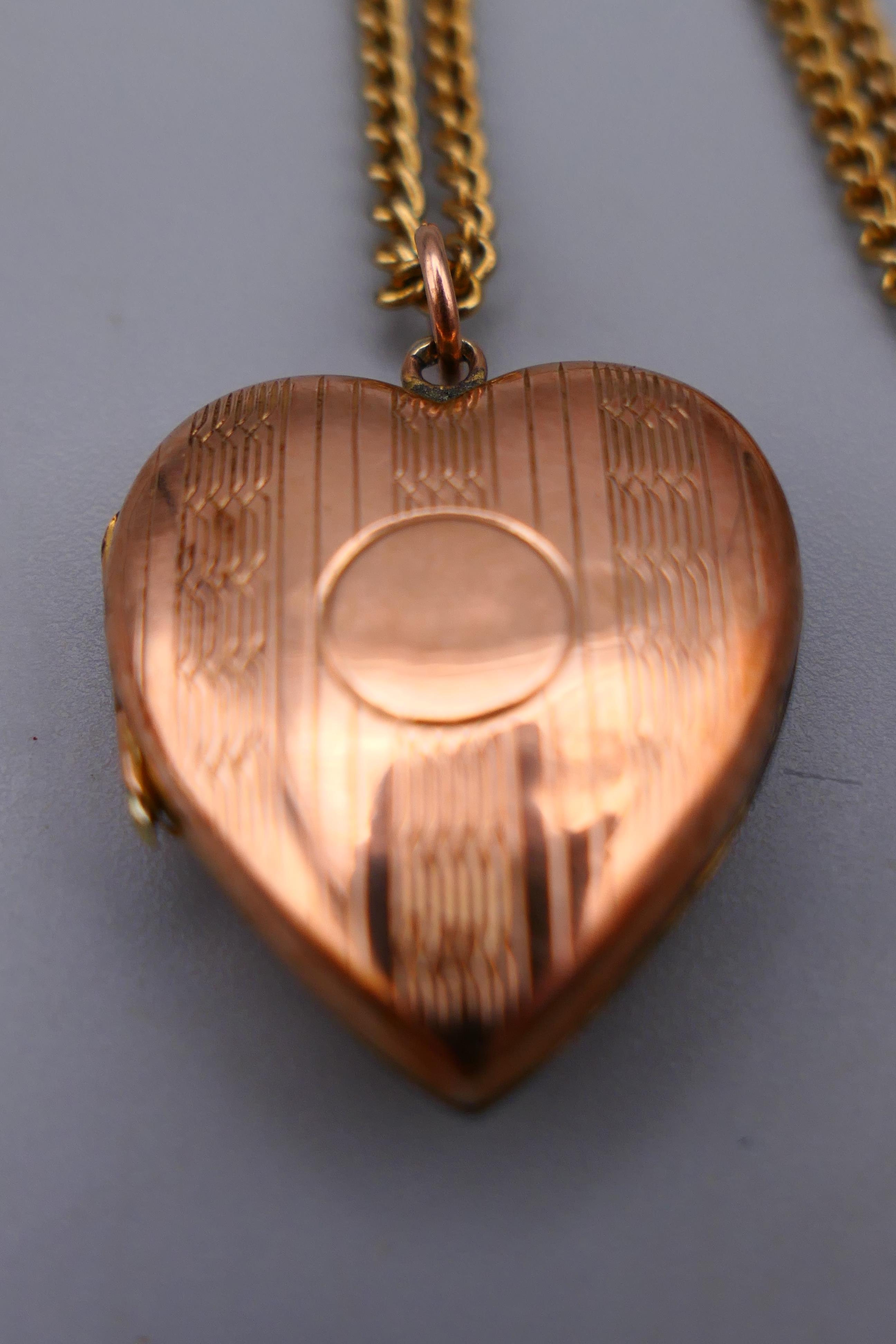 A cameo brooch, an unmounted cameo and a 9 ct gold back and front heart shaped locket on chain. - Image 2 of 7