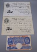 Two white £5 notes, one dated January 1945 signed Peppiatt,