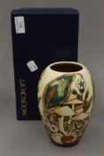 A boxed Moorcroft Underworld vase, numbered 165/350. 17.5 cm high.