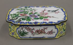 A late 19th/early 20th century Chinese Canton enamel box. 15.5 cm wide.