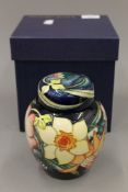 A boxed Moorcroft Golden Jubilee ginger jar. 14.5 cm high.