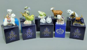 A collection of ten boxed Royal Crown Derby paperweights.