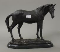 A bronze model of a horse. 22.5 cm high.