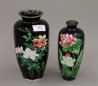 Two Japanese black cloisonne vases. The largest 21 cm high.