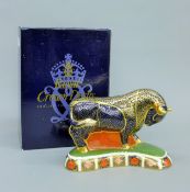 A boxed Royal Crown Derby bull form paperweight.