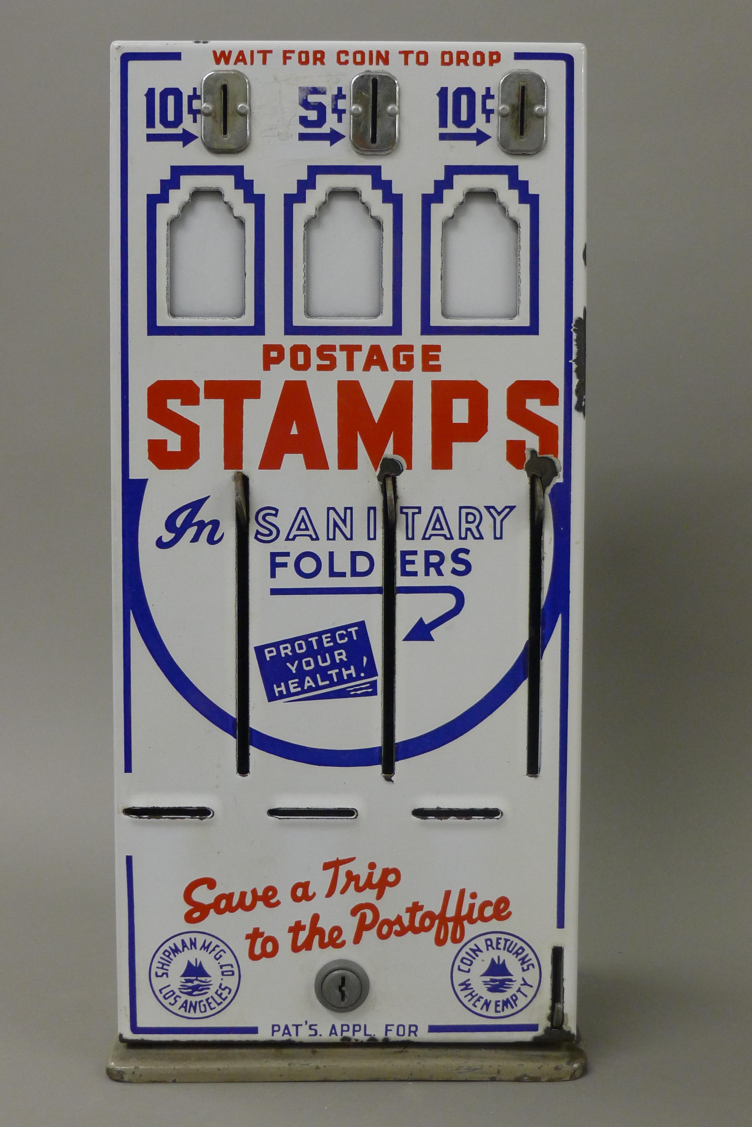 A vintage American stamp machine. 41 cm high.