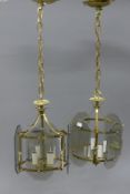 A pair of hanging lanterns. 31.5 cm high.