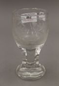 A 19th century etched Masonic glass. 14 cm high.