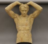 A resin male bust and torso. 77 cm high.